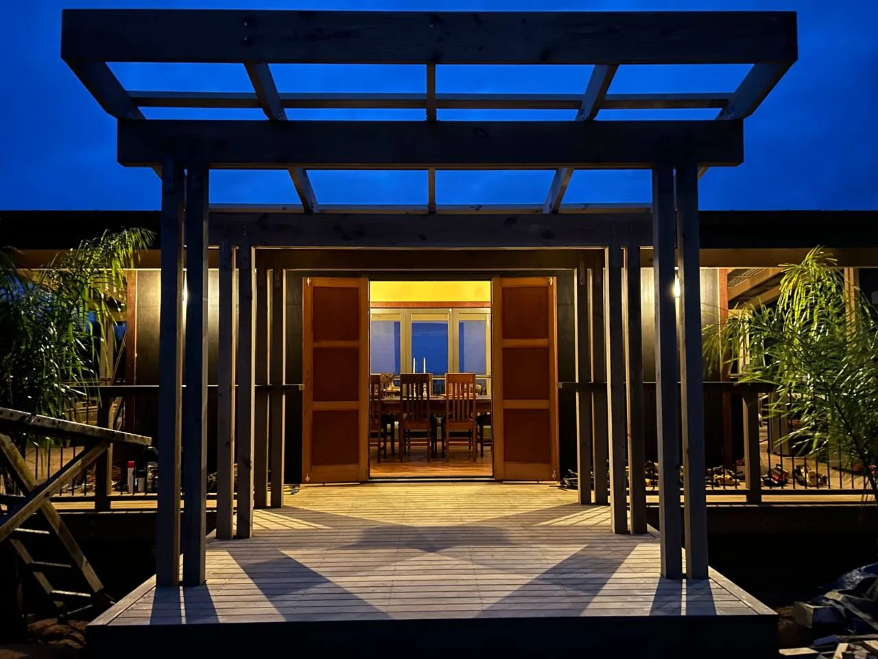 The Boardroom at Mason Canyon — entranceway at night, Great Barrier Island